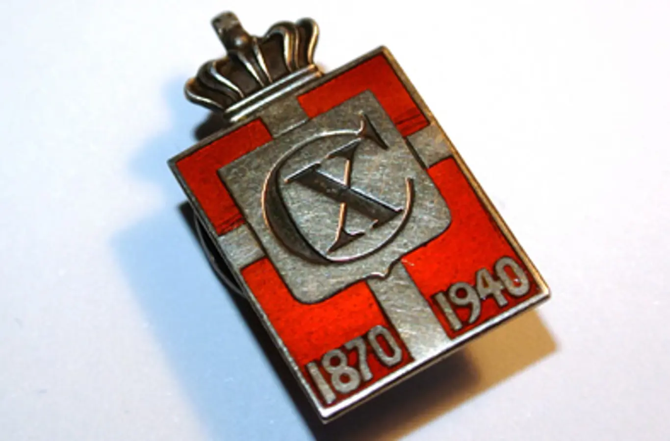 Historien bag Konge-Emblemet